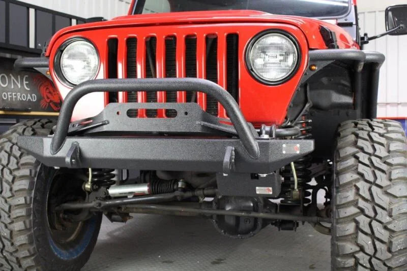 Fishbone Offroad 97-06 Jeep Wrangler TJ Steering Box Skid Plate - Black Textured Powdercoat - Installation View
