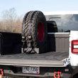 Load image into Gallery viewer, Fishbone Offroad Bed Mounted Spare Tire Mount - Installation View