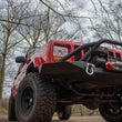 Load image into Gallery viewer, Fishbone Offroad Cherokee XJ Front Winch Bumper W/Grille Guard Bullhead Steel - Blk Txtrd Pwdrcoat - Additional View 6