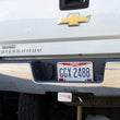 Load image into Gallery viewer, Fishbone Offroad Hitch Cover - 2In Hitch - Black Powdercoated Steel - Installation View
