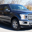 Load image into Gallery viewer, Fishbone Offroad 15-22 Ford F150 Extended Cab Oval Side Steps - Black Textured - Additional View 7