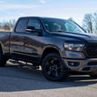 Load image into Gallery viewer, Fishbone Offroad 2019+ Dodge Ram 1500 Crew Cab Oval Side Steps - Black Textured - Installation View