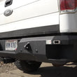 Load image into Gallery viewer, Fishbone Offroad 09-14 Ford F150 Rear Bumper - Black - Installation View