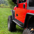 Load image into Gallery viewer, Fishbone Offroad Rock Slider W/Tube Step - Black Powdercoat fits Jeep LJ - Additional View 6