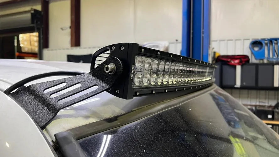 Fishbone Offroad 99-06 Chevrolet Silverado/Tahoe/Suburban Roof Mounted 50in Lightbar Bracket - Black - Side View