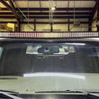 Load image into Gallery viewer, Fishbone Offroad 99-06 Chevrolet Silverado/Tahoe/Suburban Roof Mounted 50in Lightbar Bracket - Black - Back View
