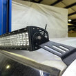 Load image into Gallery viewer, Fishbone Offroad 99-06 Chevrolet Silverado/Tahoe/Suburban Roof Mounted 50in Lightbar Bracket - Black - Installation View