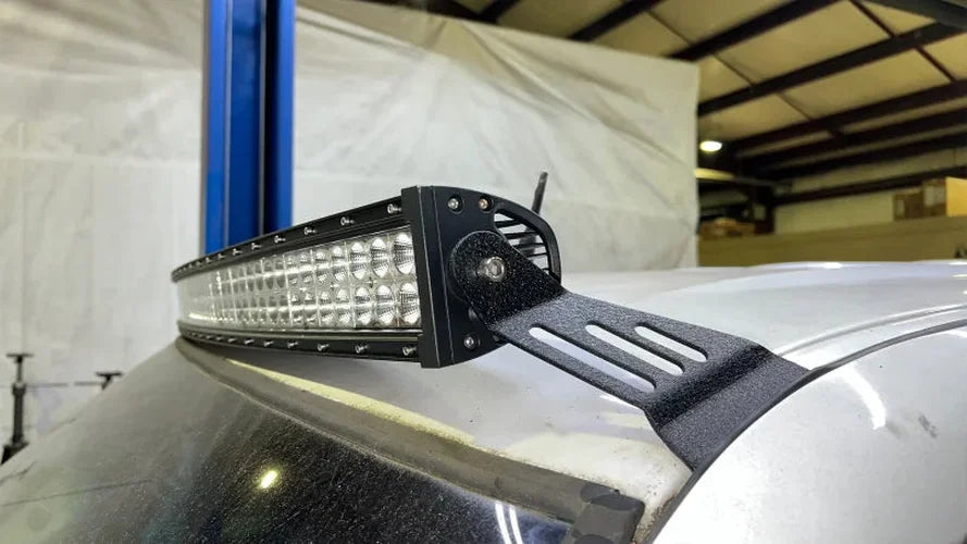 Fishbone Offroad 99-06 Chevrolet Silverado/Tahoe/Suburban Roof Mounted 50in Lightbar Bracket - Black - Installation View