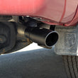 Load image into Gallery viewer, Flowmaster Flow FX Cat-Back Exhaust System fits 2014-2024 Ram 2500 / 3500 - Side View
