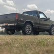 Load image into Gallery viewer, Flowmaster FlowFX Cat-Back Exhaust System fits 1996-1999 Chevrolet C1500 / C2500 / K1500 / K2500 / GMC C1500 / C2500 / K15...