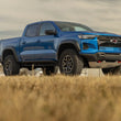 Load image into Gallery viewer, Flowmaster FlowFX Cat-Back Exhaust System fits 2023-2026 Chevrolet Colorado / GMC Canyon - Installation View