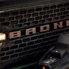 Load image into Gallery viewer, Ford Racing 2021+ Bronco Grille Lettering Overlay Kit - Bronze - Installation View