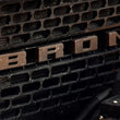 Load image into Gallery viewer, Ford Racing 2021+ Bronco Grille Lettering Overlay Kit - Bronze - Additional View 5