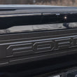 Load image into Gallery viewer, Ford Racing Carbon Fiber Tailgate Panel - Gloss fits Ford F150 / 2021-2025 Ford F-150 RAPTOR - Installation View
