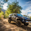 Load image into Gallery viewer, Fox 03+ 4Runner 2.0 Performance Series 9.1in Smooth Body Remote Reservoir Rear Shock / 0-1.5in. Lift - Back View