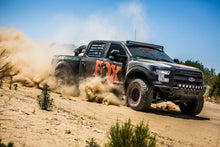 Load image into Gallery viewer, Fox 05-19 Ford F250/F350 2.0 Performance Series 11in Smooth Body IFP Front Shock /5.5-7in lift - Installation View