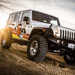 Load image into Gallery viewer, Fox 07-18 Jeep Wrangler JK 2.0 Performance Series 8.1in. TS Stabilizer 1 1/2in Tie Rod - Installation View