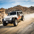 Load image into Gallery viewer, Fox 07+ Jeep JK 2.0 Performance Series 9.6in. Smooth Body IFP Front Shock (Alum) / 1.5-3.5in. Lift - Installation View