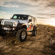 Load image into Gallery viewer, Fox 07+ Jeep JK 2.0 Performance Series 9.6in. Smooth Body Remote Res. Rear Shock / 1.5-3.5in. Lift - Installation View