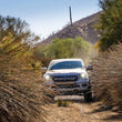 Load image into Gallery viewer, Fox 2019+ Ford Ranger 2.0 Perf Series 9.7in Smooth Body IFP Rear Shock / 0-1.5in Lift - Installation View