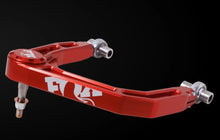 Load image into Gallery viewer, Fox 21-24 Ford F-150 Billet Upper Control Arm - Orange - Installation View