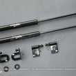 Load image into Gallery viewer, GReddy 08-11 Mitsubishi Evo X CZ4A Engine Hood Lifter Kit (Designed for OEM weight hoods.) - Side View