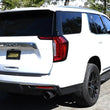 Load image into Gallery viewer, Gibson 21-23 GMC Yukon/Chevrolet Tahoe 5.3L 2/4wd Black Elite Cat-Back Exhaust -Stainless - Side View