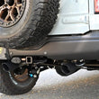 Load image into Gallery viewer, Gibson 2.5in Black Elite Cat-Back Dual Split Exhaust - Stainless fits 2021-2025 Ford Bronco 4-dr 2.7L 4WD - Side View