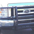 Load image into Gallery viewer, Go Rhino 08-14 Ford E-250/E-350 Econoline Van 3000 Series StepGuard - Black - Installation View