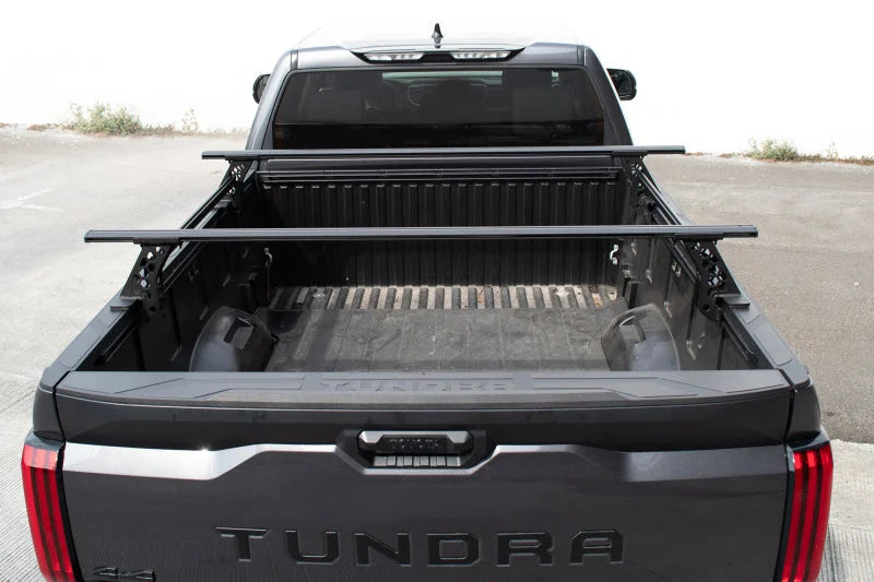 Go Rhino 15-22 Ford F-150 / 19-22 RAM 1500 / 07-21 Toyota Tundra XRS Cross Bars Kit - Tex. Blk - Installation View