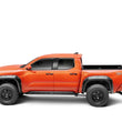 Load image into Gallery viewer, Go Rhino 2024 Toyota Tacoma DC 4dr Xtreme Frame Mount Sliders - Tex. Blk - Installation View