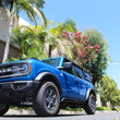 Load image into Gallery viewer, Go Rhino 21-24 Ford Bronco 4WD 4dr (Excl. Bronco Sport) Frame Mount Sliders - Tex. Blk - Back View
