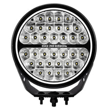 Load image into Gallery viewer, Go Rhino Xplor Blackout Series Round LED Sgl Driving Kit w/DRL (Surface/Thread Stud Mnt) 9in. - Blk - Main Product View