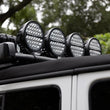 Load image into Gallery viewer, Go Rhino Xplor Blackout Series Round Single LED Spot Light Kit w/DRL (Surface Mount) 9in. - Blk - Additional View 7