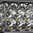 Load image into Gallery viewer, Go Rhino Xplor Bright Series Sideline Cube LED Spot Light Kit (Surface Mount) 4x3 - Blk (Pair) - Side View