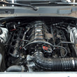 Load image into Gallery viewer, Grams Performance 05-18 Dodge Hemi 5.7L/6.1L/6.2L/6.4L Fuel Rail - Black - Side View