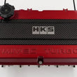 Load image into Gallery viewer, HKS CARBON PLUG COVER 4G63 (Lancer Evolution IV - IX) - Side View
