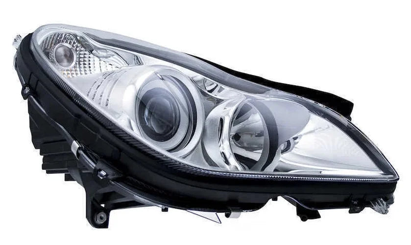 Hella Headlight Assembly 008821061 fits 2006 Mercedes-Benz CLS500 / 2006 Mercedes-Benz CLS55 Amg / 2007-2011 Mercedes-Benz...