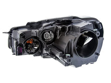 Load image into Gallery viewer, Hella Headlight Assembly 009901261 fits 2010-2014 Volkswagen GTI / 2010-2014 Volkswagen Golf - Side View
