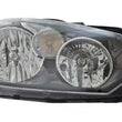 Load image into Gallery viewer, Hella Headlight Assembly 010310081 fits 2010-2014 Volkswagen Jetta - Installation View