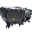 Load image into Gallery viewer, Hella Headlight Assembly 011150391 fits 2012-2014 Audi A6 / 2012-2014 Audi A6 Quattro - Side View