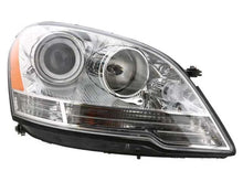 Load image into Gallery viewer, Hella Headlight Assembly 263064061 fits 2007-2009 Mercedes-Benz ML320 / 2007-2011 Mercedes-Benz ML350 / 2010-2011 Mercedes...