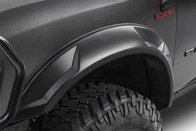 Load image into Gallery viewer, Husky Liners 19-23 RAM 2500/3500 DRT Style Fender Flares (Smooth) 4pc - Blk - Main Product View