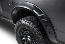 Load image into Gallery viewer, Husky Liners 19-23 RAM 2500/3500 DRT Style Fender Flares (Smooth) 4pc - Blk - Installation View