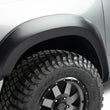 Load image into Gallery viewer, Husky Liners 19-24 Ram 1500 Extend-A-Fender Fender Flares - 4pc Black - Back View