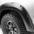 Load image into Gallery viewer, Husky Liners 19-24 Ram 1500 Rebel Front &amp; Rear Pocket Style Fender Flares - Black - Side View