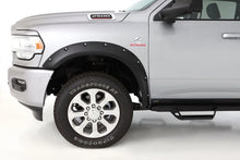 Load image into Gallery viewer, Husky Liners 19-25 Dodge RAM 3500 Pocket Style 4pc Fender Flares - Back View