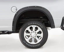 Load image into Gallery viewer, Husky Liners 19-25 Dodge RAM 3500 Pocket Style 4pc Fender Flares - Installation View