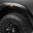 Load image into Gallery viewer, Husky Liners 19-26 RAM 2500/3500 RVL Style Fender Flares - 4pc - Back View