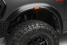 Load image into Gallery viewer, Husky Liners 19-26 RAM 2500/3500 RVL Style Fender Flares - 4pc - Installation View